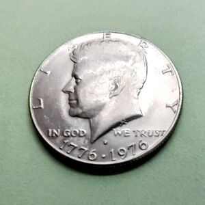 1976-P Bicentennial Kennedy Half Dollar Coin In good Circulated Condition.
